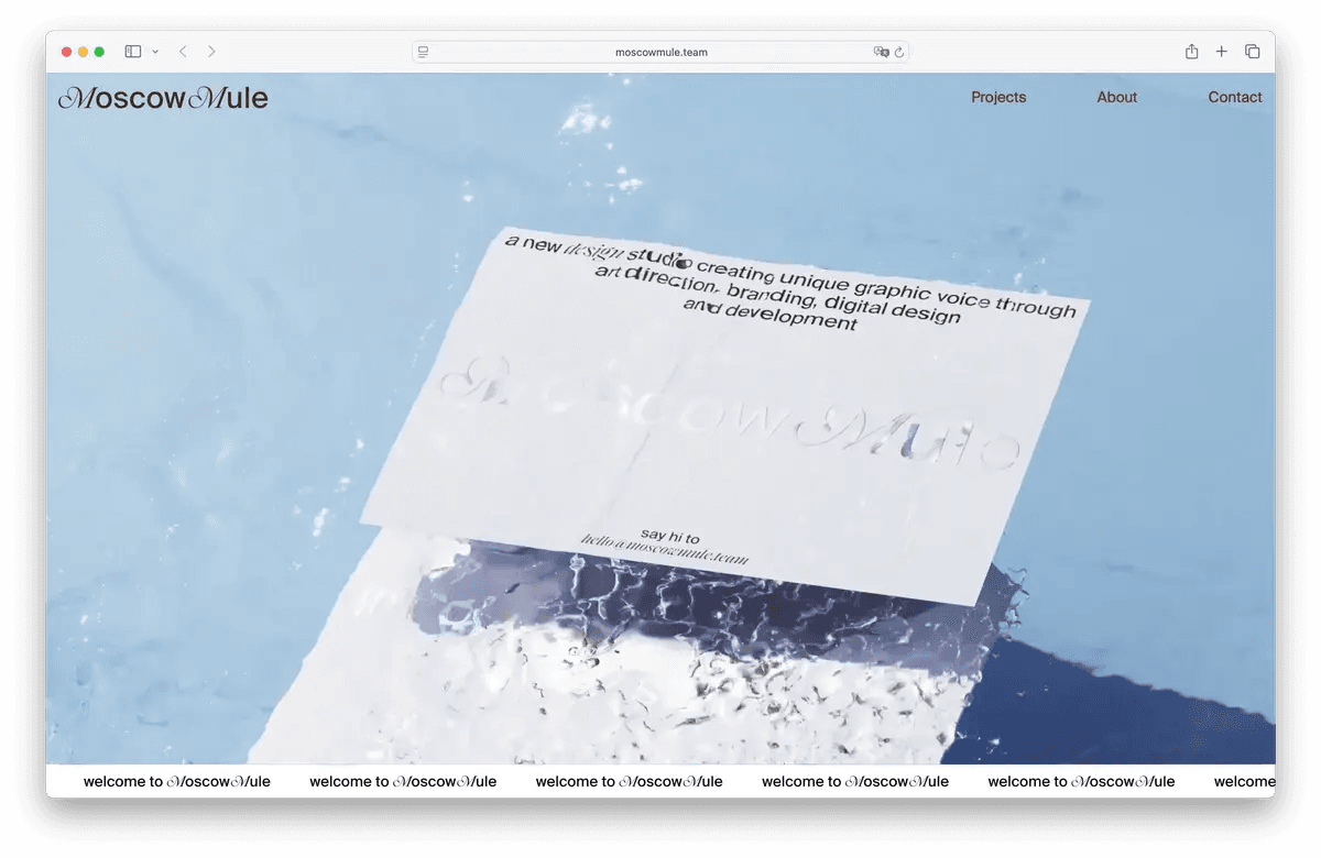 Moscow Mule studio portfolio with a white typography card over moving water
